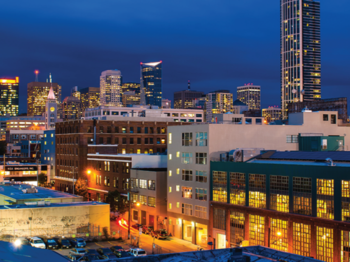 warehouses and buildings lit at night